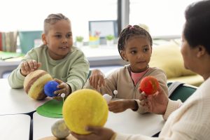 kids-learning-about-planets-classroom-min